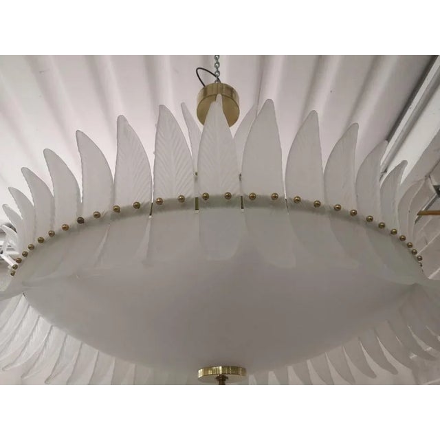 Riot of leaves, from an elegant sandblasted color. Very nice, rich and original design. Gold iron and brass structure with...