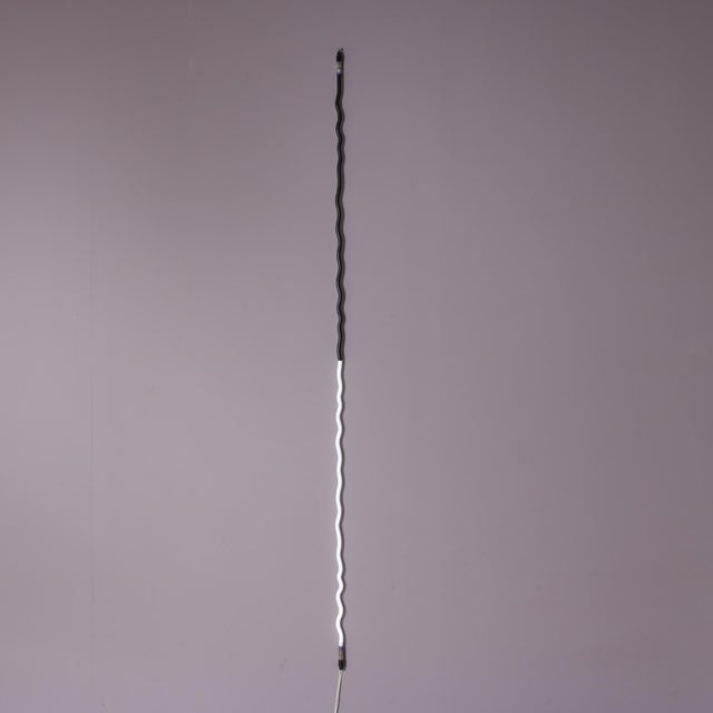 Dating from the 2000s, this striking light object was created by the renowned Dutch artist Jan van Munster. Designed to be...