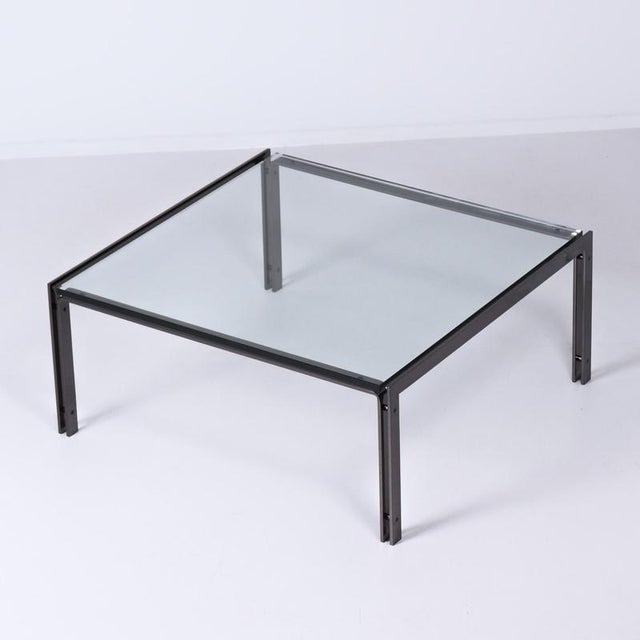 Metaform M1 coffee table from the 1980s with a 2 cm thick clear glass top, made by the Dutch company Metaform in a special...
