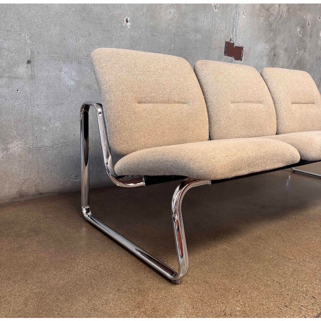 Elevate your space with this striking vintage 1987 tandem bench by Steelcase. Featuring a sculptural, heavy-duty tubular...