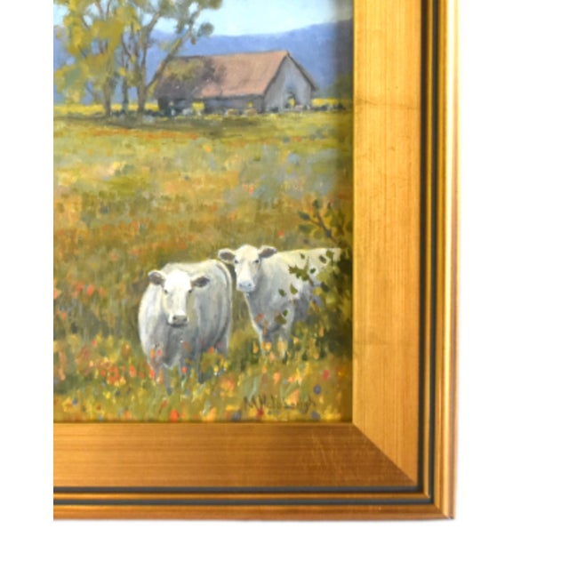 Impressionist cows in a field of flowers with barn oil painting on stretched artist's canvas. It is signed by the artist...