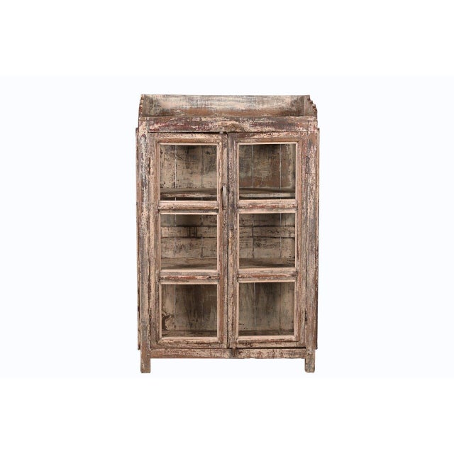 Full of character and old-world charm, this Vintage Anglo-Indian Painted Teakwood Small Bookcase is handcrafted from solid...