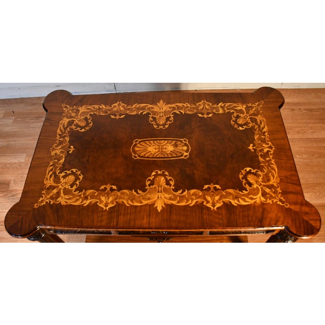 We are pleased to offer this beautiful French Louis XVI sofa table, from the 1930s. This table is made on Walnut wood,...