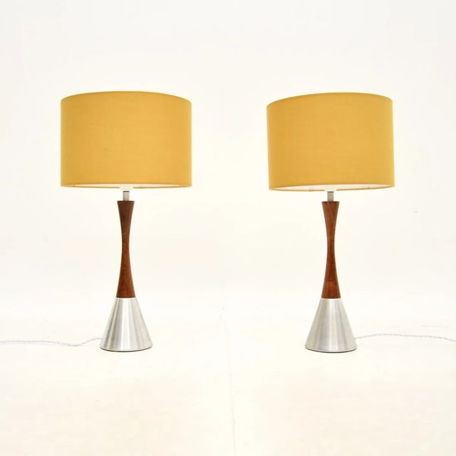 A stylish and very well made pair of Swedish vintage wood and steel table lamps by Bergboms, dating from the 1960-70s. The...