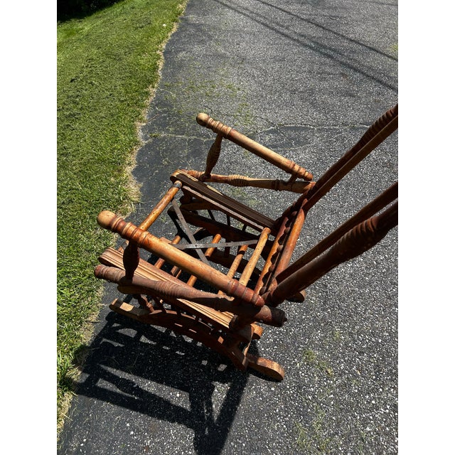 Rustic 19th century Indian rocking chair Unique detail would accent any room or porch area . Still in rocking condition