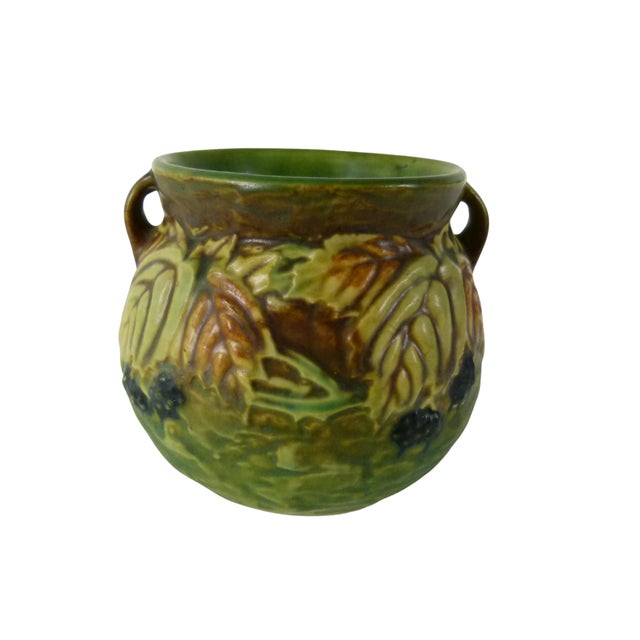 A true "middle period" masterpiece, this piece captures the rustic elegance of the Arts and Crafts movement. It features...