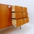 Sleek and minimalist mid-century Belgian design. Measures : 120.5x48cm - H: 76cm -Sideboard in teak, designed by Alfred...