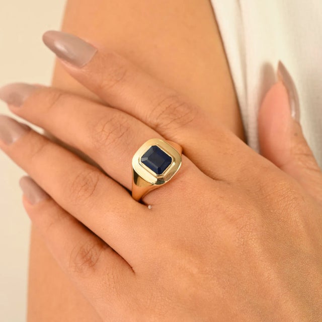 Elevate your collection with this striking 14K Yellow Gold Blue Sapphire Ring, designed in a classic vintage-inspired...