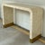 Stylish Modern Mother of Pearl Waterfall Console Table, brass legs, showroom floor sample