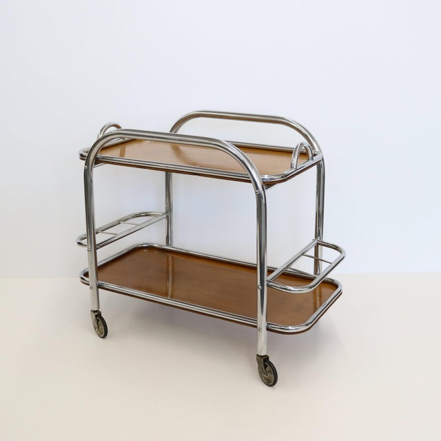 An Art Deco bar cart designed by renound French architect Robert Mallet-Stevens. (1886-1945). Stevens was the founder of...
