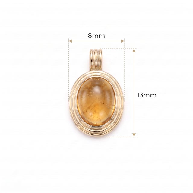Warm your jewelry collection with the glowing honey tones of this smooth Citrine cabochon pendant. Encased within a multi-...