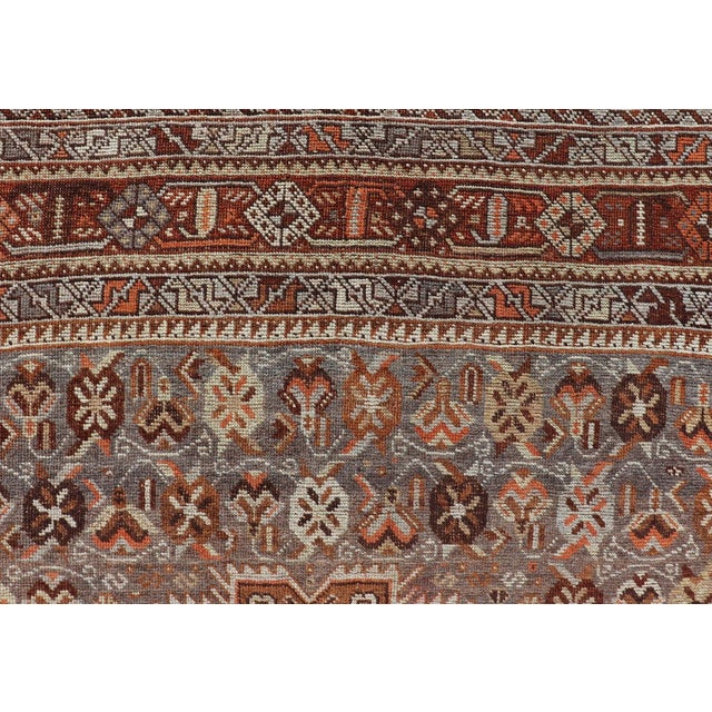 Textile Early 20th Century Geometric Persian Shiraz Rug With Tri-Medallion Design in Shades Orange Blue For Sale - Image 7 of 13