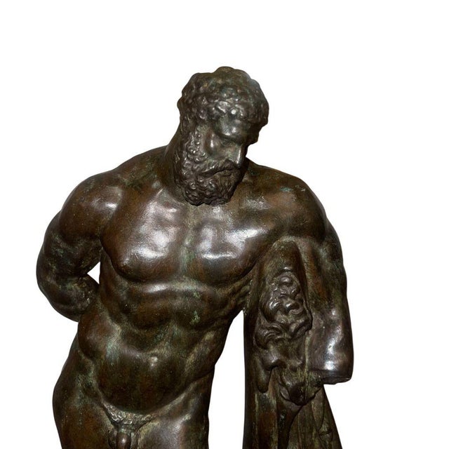An expressive Italian bronze sculpture of Hercules, dating to the early 20th century and modeled after classical Greco-...