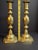 This is an authentic, original matching pair of late Victorian heavy cast brass candlesticks in the famous "The Queen of...