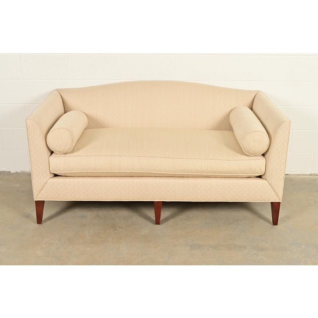 A gorgeous and very comfortable modern Regency style camelback upholstered sofa or loveseat By Barbara Barry for Baker...