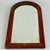 A rare to market small arched top wood framed antique mirror. Lovely distressed glass and naturally aged wood frame. The...