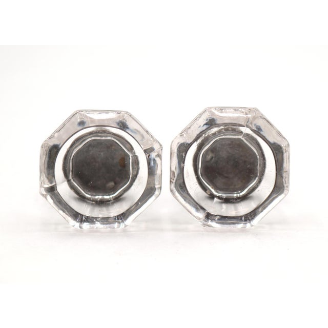 Vintage cabinet or drawer knobs made of clear glass with an octagon shape and brass shanks. Mounting screws are included....