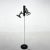 Italian vintage floor lamp in chrome and black metal. The lamp has three adjustable spot lights in all directions. Good...