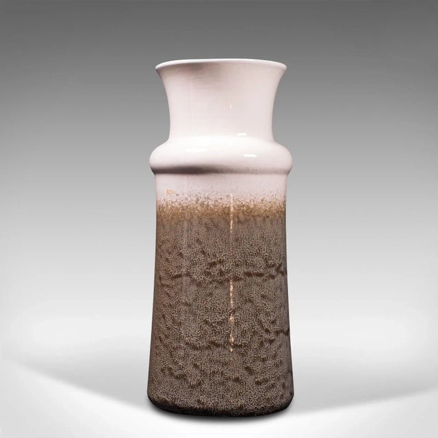 This is a vintage decorative lava vase. A German, ceramic flower stand with the distinctive mid-century finish, circa...