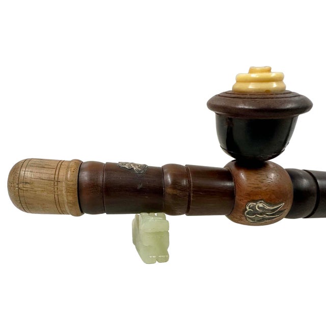 The image shows an antique Chinese smoking implement, an opium pipe, dated to the early Republican period. The stem is...