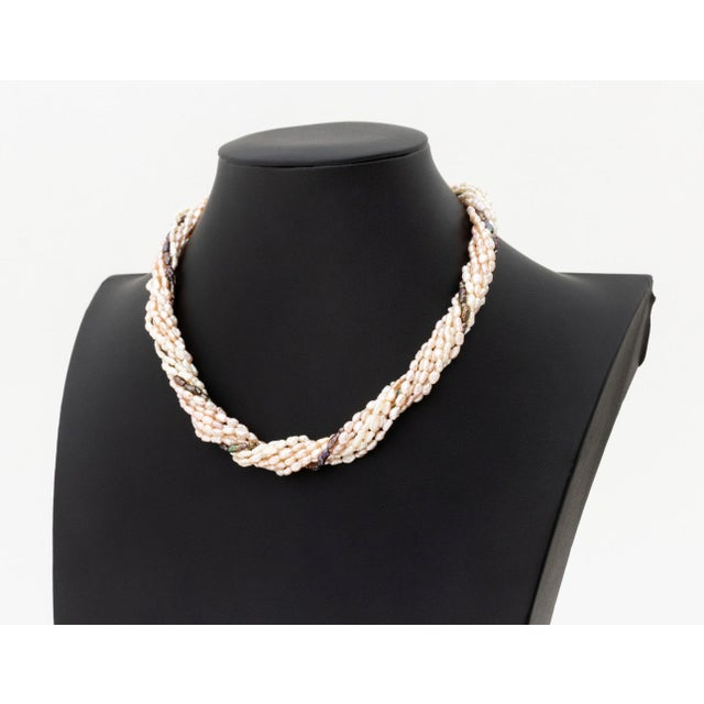 Pomellato 18K Yellow Gold and Baroque Pearl Multi-Strand Necklace, decorated with one black baroque seed pearl strand and...