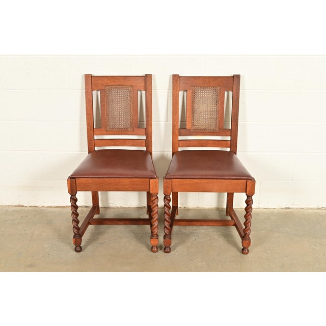 An exceptional pair of antique Mission or Arts & Crafts period side chair or dining chairs By Stickley Brothers USA, Circa...