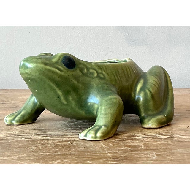 Infuse your indoor garden or shelf vignette with a touch of whimsical charm using this delightful vintage ceramic frog...