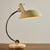An iconic Bauhaus piece. The table lamp was designed by Christian Dell for Koranda in the 1950s. The angle and height of...