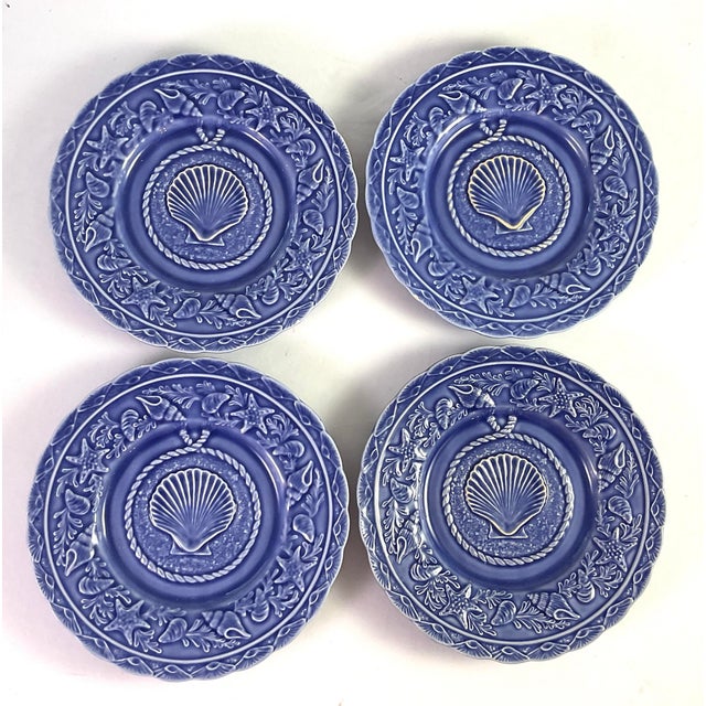 Bordallo Pinheiro-“Seashell Service Blue”-luncheon/dinner plates Set of four Special characteristic, a scallop shell in...