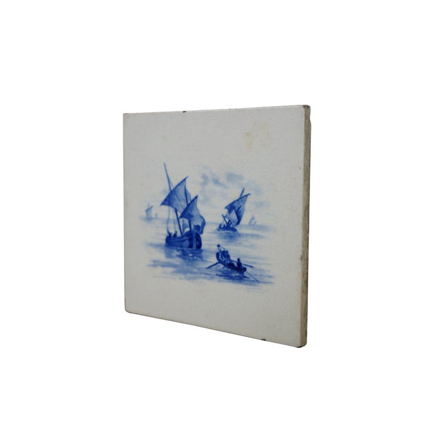 Antique 18th century Dutch Delft cobalt blue ceramic tile featuring a maritime scene with ships / boats / sailboats....
