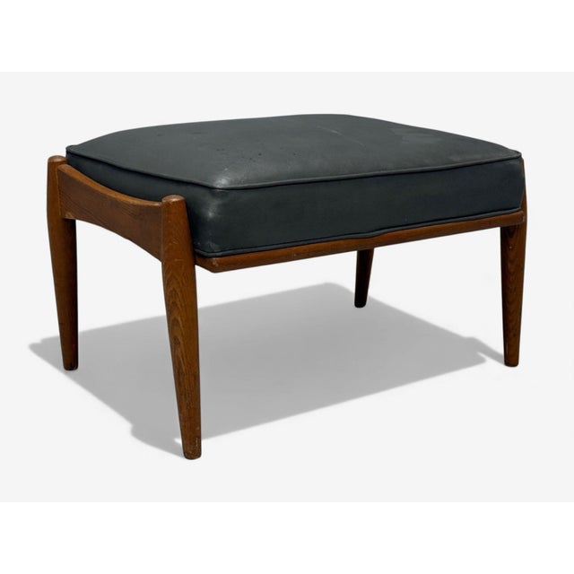 Danish Mid-Century Modern, Gray Leatherette, Walnut, Footstool or Ottoman, Denmark, 1950s A leatherette and walnut stained...