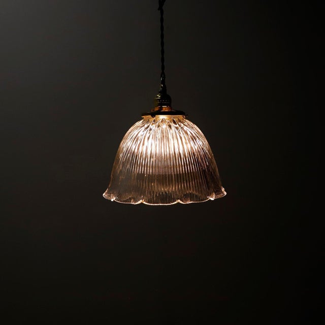 We offer this Holophane Clear Glass Vintage Industrial Pendant Light. Prismatic glass shades in excellent condition. The...