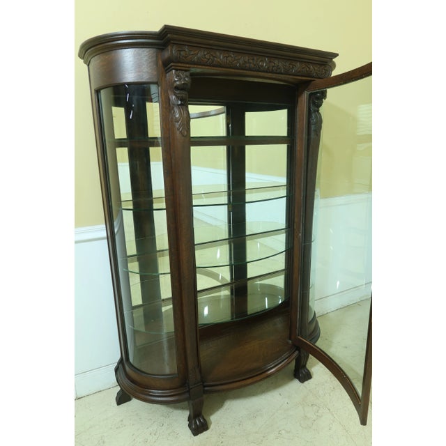 C.1890s Glass Adjustable Shelves Fine Carved Details High Quality Construction Carved Paw Feet Mirrored Back Solid Oak See...