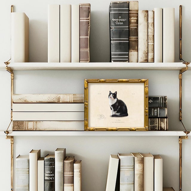 This reproduction print of a classic Tuxedo cat is from our vintage "Le Chat" series. Please note there are multiple...