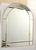 This Stunning 1970s Venetian Arch Wall mirror is a refined decorative piece featuring a beveled glass central panel with...