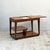 A drinks trolley by Remploy with a sliding top. Closed, it reads as a neat rectangle with a raised lip along the edges....