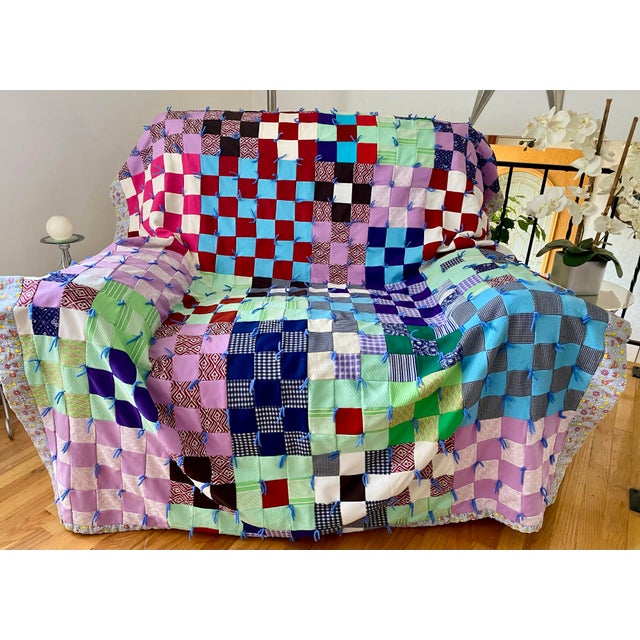 This sweet vintage 70s quilt is perfect for your bedroom or living area! It is made from an array of bright, colorful...