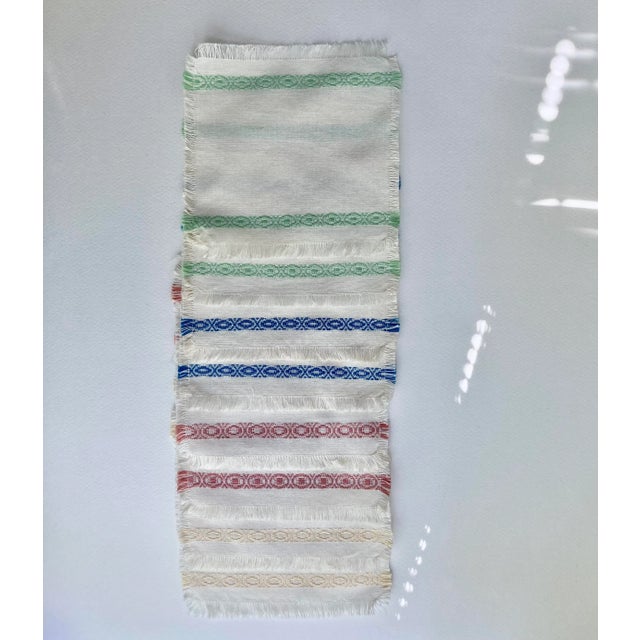 Eight handcrafted Mid Century Modern woven Off-White fringed Linen colorful Coasters. Featuring fringed embroidered Linen...