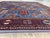 This vintage rug was hand-knotted in wool, woven in Afghanistan in the Moghan Kazak Caucasian tribal design tradition....