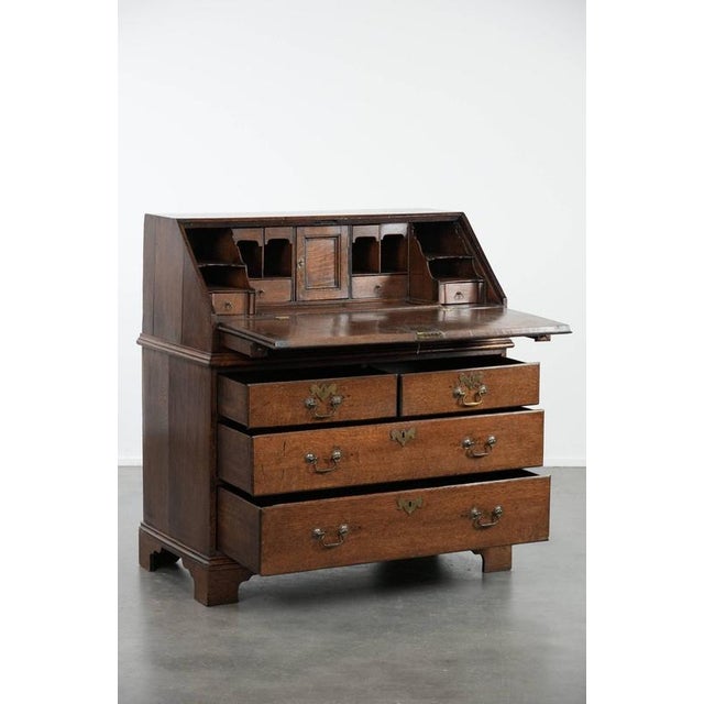 Large, antique, 18th-century English oak chest of drawers/desk/chest of drawers with secret compartments and a stepped...