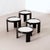 Minimalist vintage tables with reversible tops in black or white. Designed by Gianfranco Frattini and manufactured by...