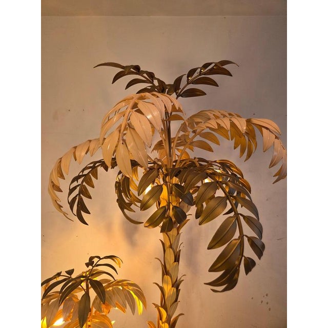 Striking and highly decorative extra large palm tree floor lamp designed by Hans Kögl in Germany during the 1970s. This...