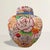 A riot of color contained in a single form: this mid-20th century Japanese cloisonné ginger jar dazzles with a large-scale...