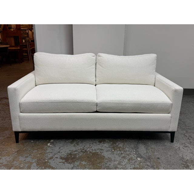 Design Plus Gallery presents the Modern Robin Loveseat by Room & Board. This loveseat is upholstered in Orla White...