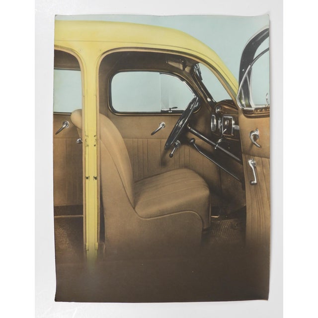 Early 20th century colortone advertising photograph of the interior of a yellow car. Unsigned. Unframed, edge and corner...