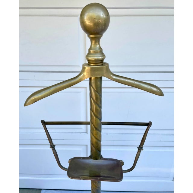 Here is a gorgeous valet stand that is from the early 1900's - 1940's. It is made of brass and has a wonderful patina. The...