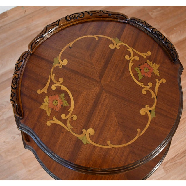 We are pleased to offer this beautiful French Louis XV two-tier table, from the 1920s. This table is made of Walnut wood,...