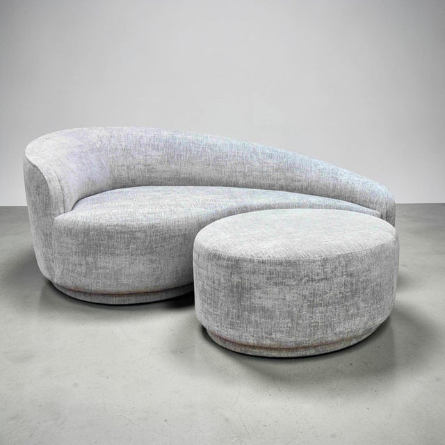 Interlude Home Dana Left-Arm Sofa/Chaise with Ottoman. Designed to favor the iconic mid-century Comma sofa, features a...
