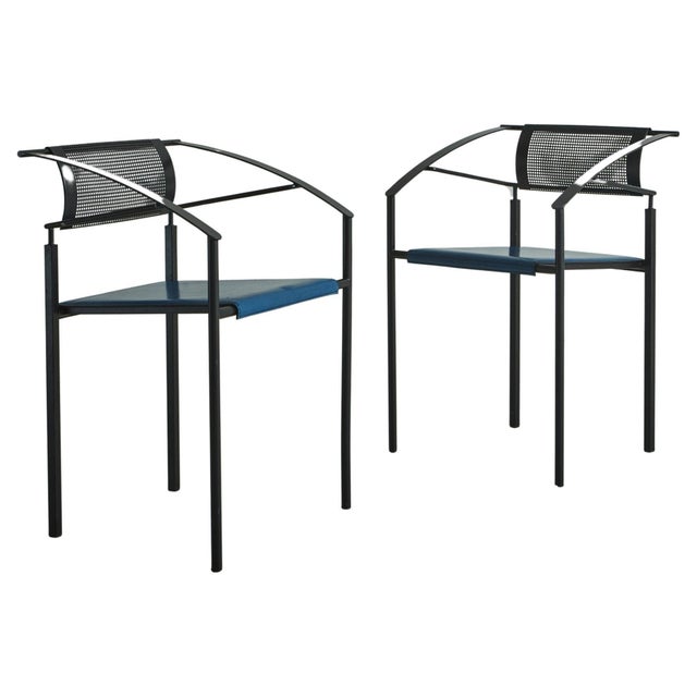 A postmodern Italian ‘Carrè VI’ chair by Fly Line. This striking chair features a black iron frame with angular arms,...