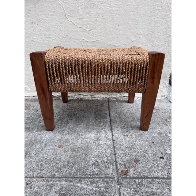 A beautifully crafted rope footstool in the tradition of French mid-century makers Audoux-Minet, whose work defined the...